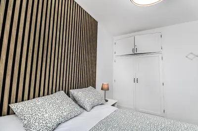 Cama o camas de una habitación en Bright Amadores Seaview Apartment