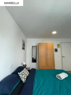 Cama o camas de una habitación en CoLiving El Juan