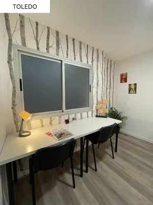 Una televisión o centro de entretenimiento en CoLiving El Juan
