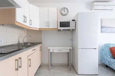 Una cocina o zona de cocina en Sandra Amadores