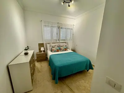 Cama o camas de una habitación en Deluxe Ciudad Jardin - by Gestión Vacacional Canarias
