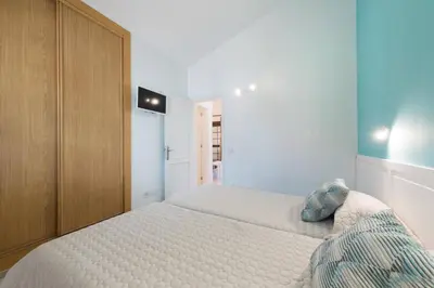 Cama o camas de una habitación en Cozi Bungalow in Maspalomas