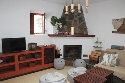 Una televisión o centro de entretenimiento en Finca Esther