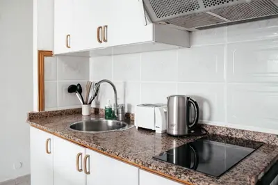 Una cocina o zona de cocina en Apartamento Tamarasol 2