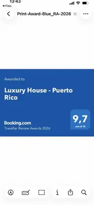 Certificado, premio, señal o documento que está expuesto en Luxury House - Puerto Rico