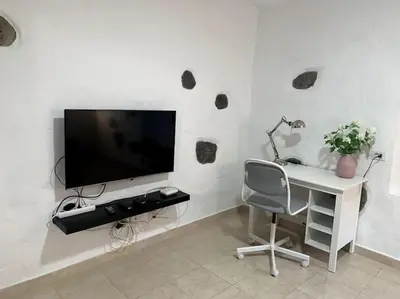 Una televisión o centro de entretenimiento en Casa (bajo), Tasarte.