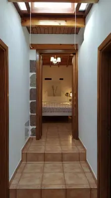 Cama o camas de una habitación en Tasarte. Casa Adosada. Berajot 7.