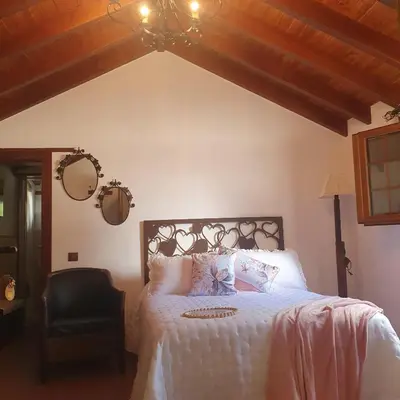 Cama o camas de una habitación en La Gallania de Papá Pepe
