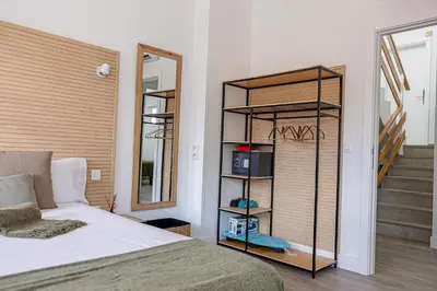 Cama o camas de una habitación en Bambú Suites Vegueta Alquiler por Habitación