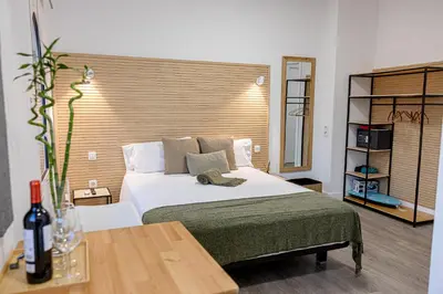 Cama o camas de una habitación en Bambú Suites Vegueta Alquiler por Habitación