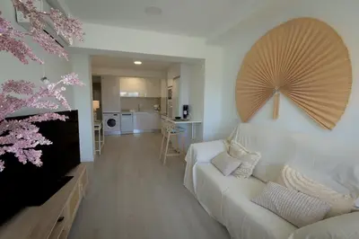 Una televisión o centro de entretenimiento en Relax Las Canteras Isleta