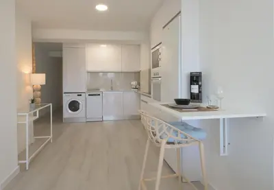 Una cocina o zona de cocina en Relax Las Canteras Isleta