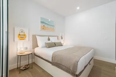 Cama o camas de una habitación en Home2Book Bright & Stylish Studio in La Isleta