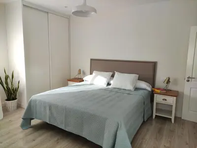 Cama o camas de una habitación en Atlantica Suite Las Canteras with Parking