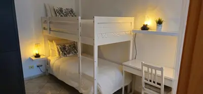 Cama o camas de una habitación en Vivienda vacacional a 10 minutos de la capital.