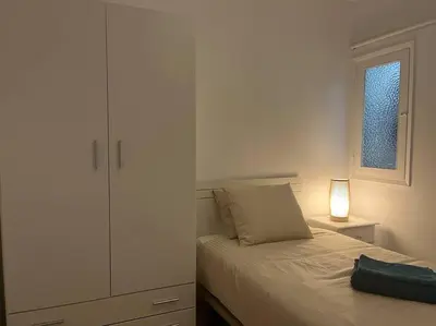 Cama o camas de una habitación en Pieds dans l'eau - vue sur mer - Playa de Melenara