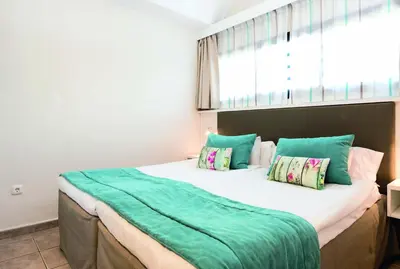 Cama o camas de una habitación en Grupotel Las Pitas