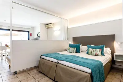 Cama o camas de una habitación en Grupotel Las Pitas