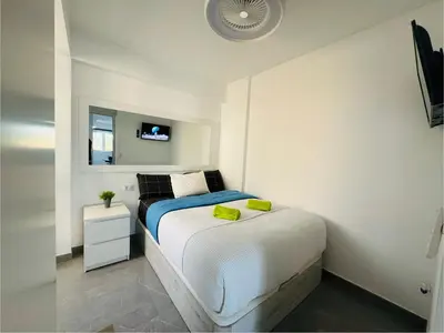 Cama o camas de una habitación en JeLe Guest Room
