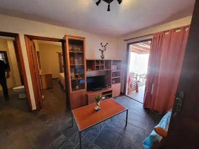 Una televisión o centro de entretenimiento en Terraza de Veneguera