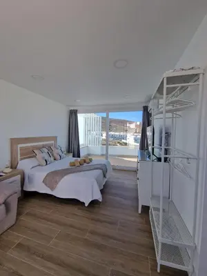 Cama o camas de una habitación en Alojamientos Agaete Pueblo Nº9