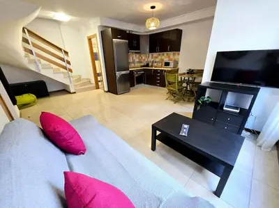 Una televisión o centro de entretenimiento en VV Dúplex Playa de Las Canteras 