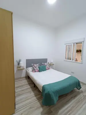 Cama o camas de una habitación en Padilla 56