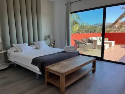Cama o camas de una habitación en VILLA Cooper l HEATED Pool l PVT Garden I GOLF I SEA VIEWS