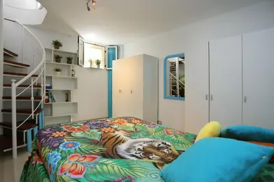 Cama o camas de una habitación en GARDEN HOUSE