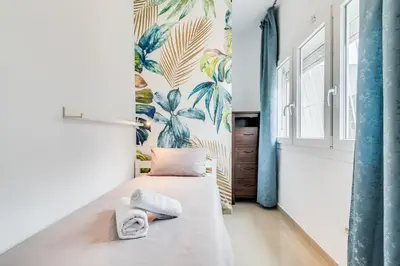 Cama o camas de una habitación en Home2Book Stunning Sea Front Apartment La Garita