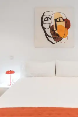 Cama o camas de una habitación en Home2Book Cozy & Chic Apartment near the Beach