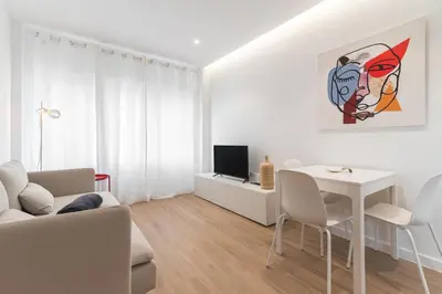 Una televisión o centro de entretenimiento en Home2Book Comfy & Chic Apartment near the Beach
