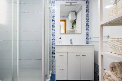 Un baño de ROSALES BEACH
