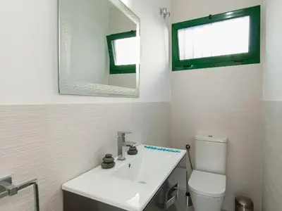 Un baño de Apartment Las Burras by VillaGranCanaria