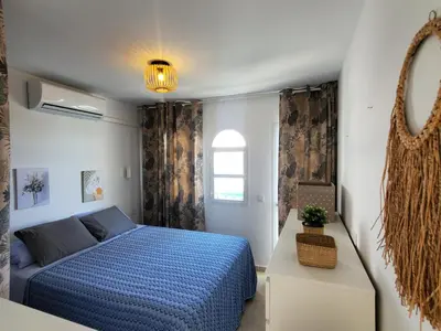 Cama o camas de una habitación en Dunaflor - everyday a holiday