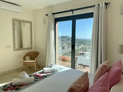 Cama o camas de una habitación en Villa 1 in Salobre Golf with private pool and great views