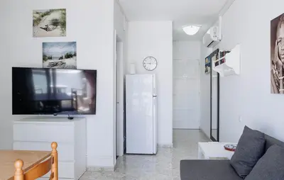 Una televisión o centro de entretenimiento en Apartamento Sol y Mar