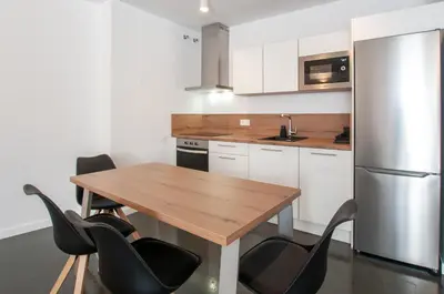 Una cocina o zona de cocina en La Casa de San Juan - ARTEMI