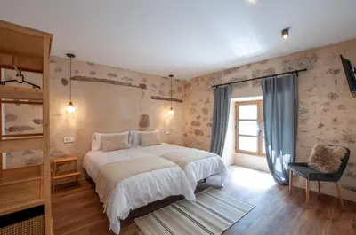 Cama o camas de una habitación en La Casa de San Juan - BENTEJUI