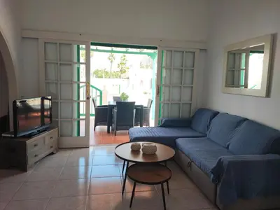 Zona de estar de splendid bungalow next to dunes