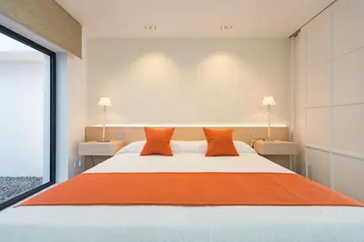 Cama o camas de una habitación en Altos de la Gloria Beach Apartments
