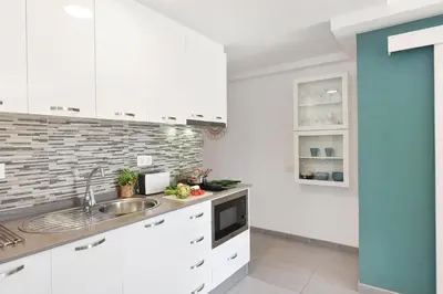 Una cocina o zona de cocina en Aida 112 by VillaGranCanaria
