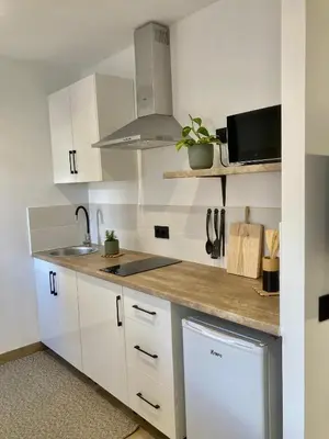 Una cocina o zona de cocina en Ático El Mirador