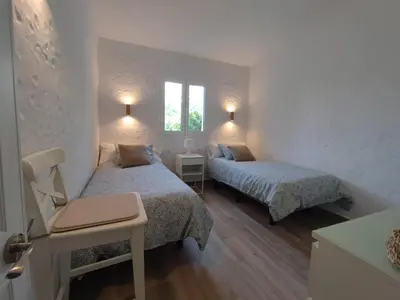 Cama o camas de una habitación en Relax bungalow with parking