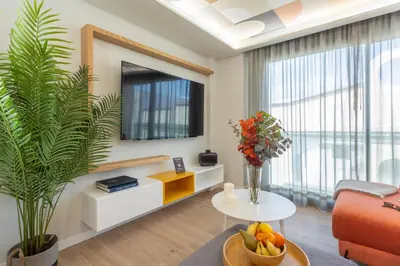 Una televisión o centro de entretenimiento en Eleven Boutique Apartments by Airnest