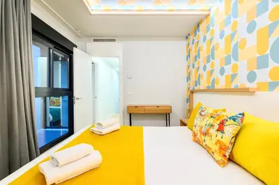 Cama o camas de una habitación en Eleven Boutique Apartments by Airnest