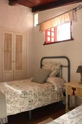 Cama o camas de una habitación en Casa Rural Tintilla