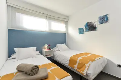 Cama o camas de una habitación en La Isla 6 by VillaGranCanaria