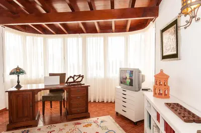 Una televisión o centro de entretenimiento en Rural Village Salobre by VillaGranCanaria