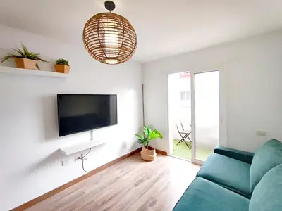 Una televisión o centro de entretenimiento en Pozo Wave Properties